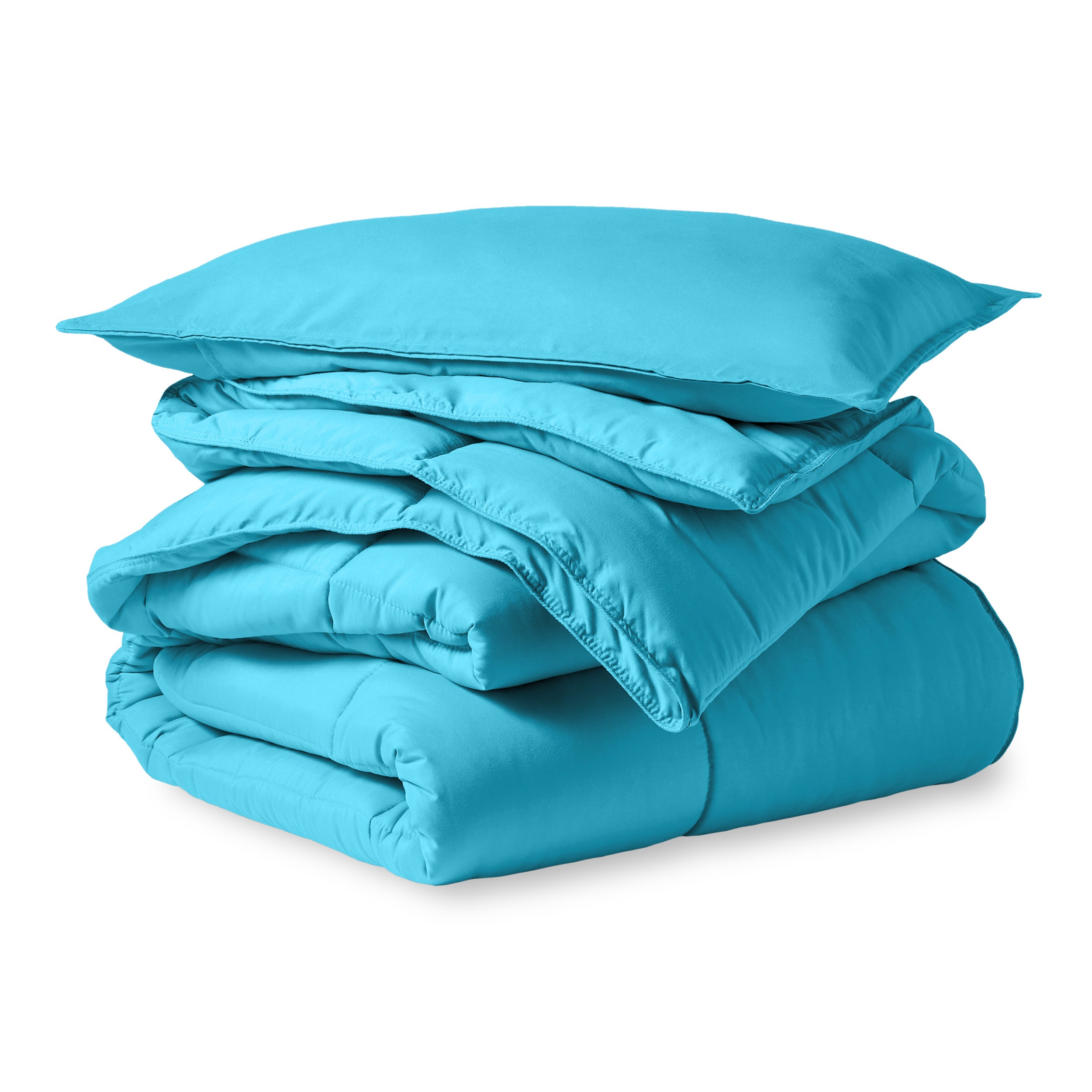 A microfiber comforter folded neatly with a pillow from above