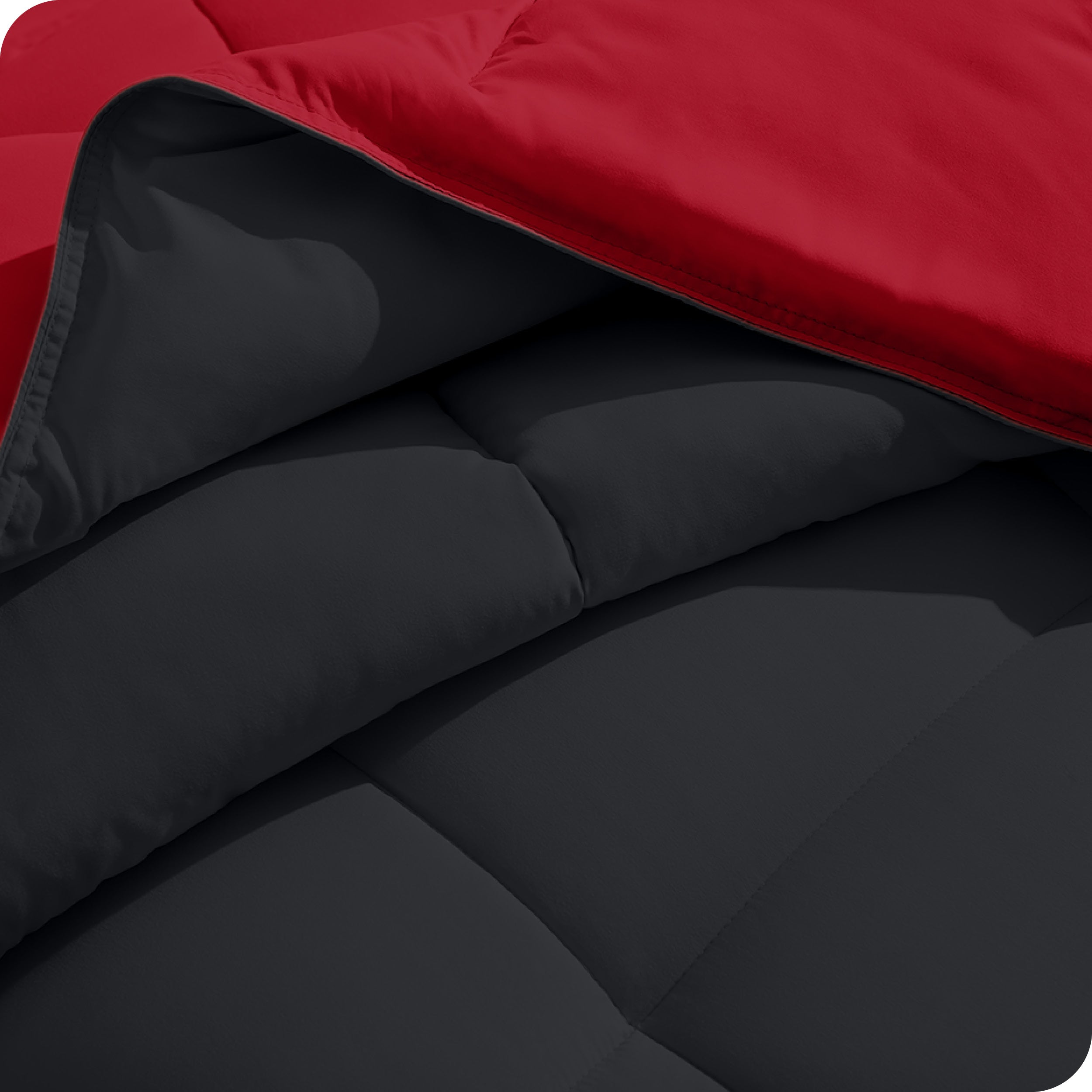 Close up of the comforter folded back showing the two different colored sides.