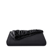 Fitted sheet neatly folded on a white background