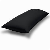 A body pillow cover on a pillow on a plain white background