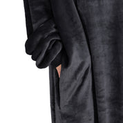 Close up of a side pocket on a microplush wearable blanket
