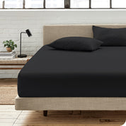 An organic cotton fitted sheet on a mattress