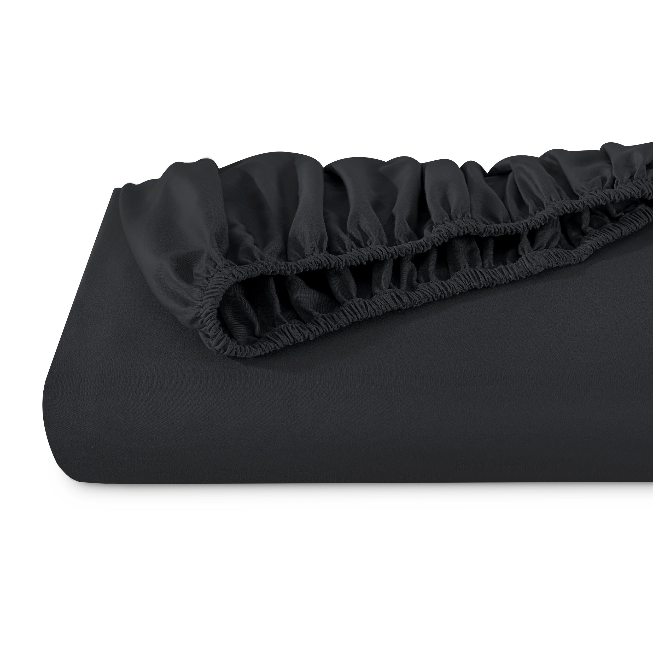 A single fitted sheet folded neatly showing part of the elastic