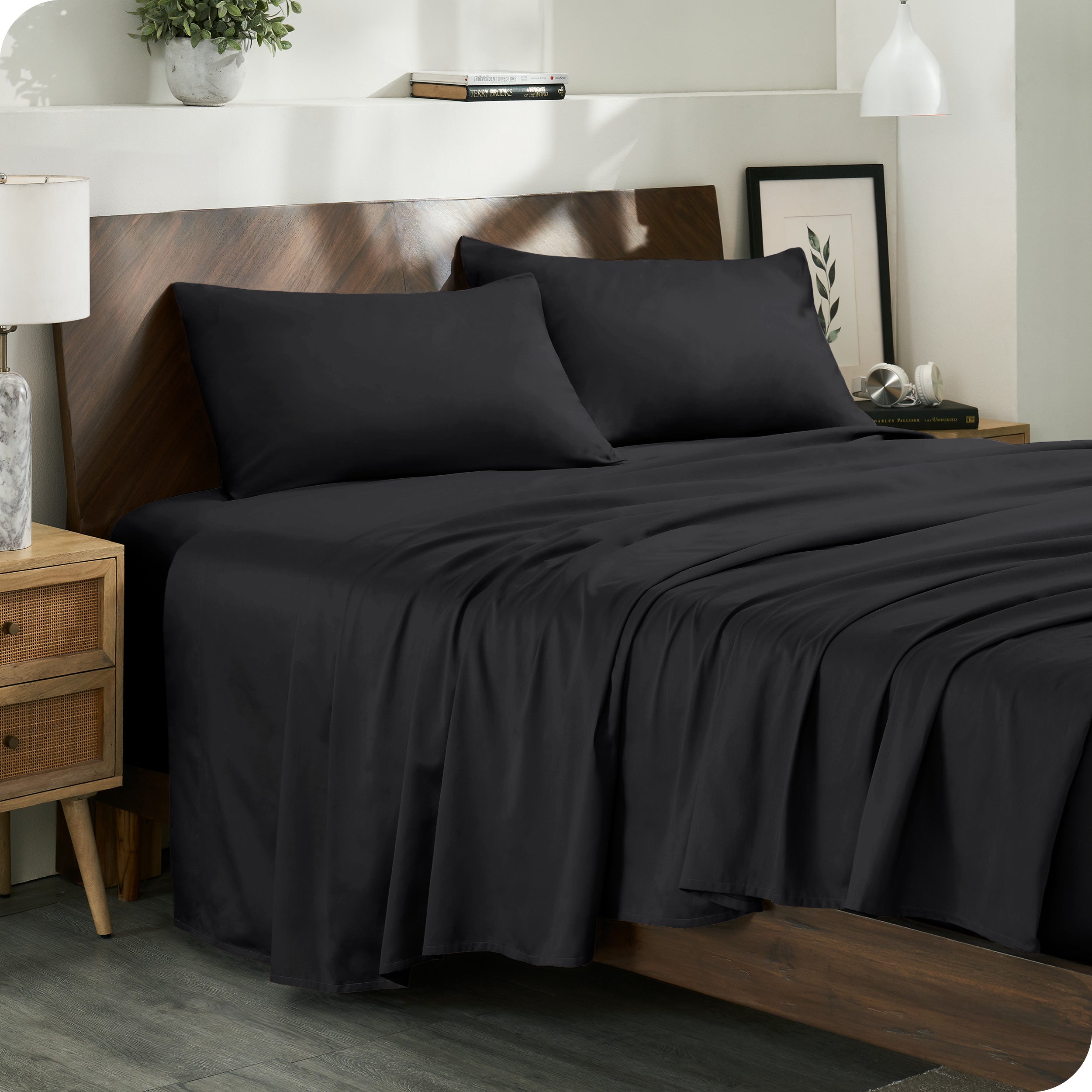 Diagonal view of a decorated room scene with sateen sheets