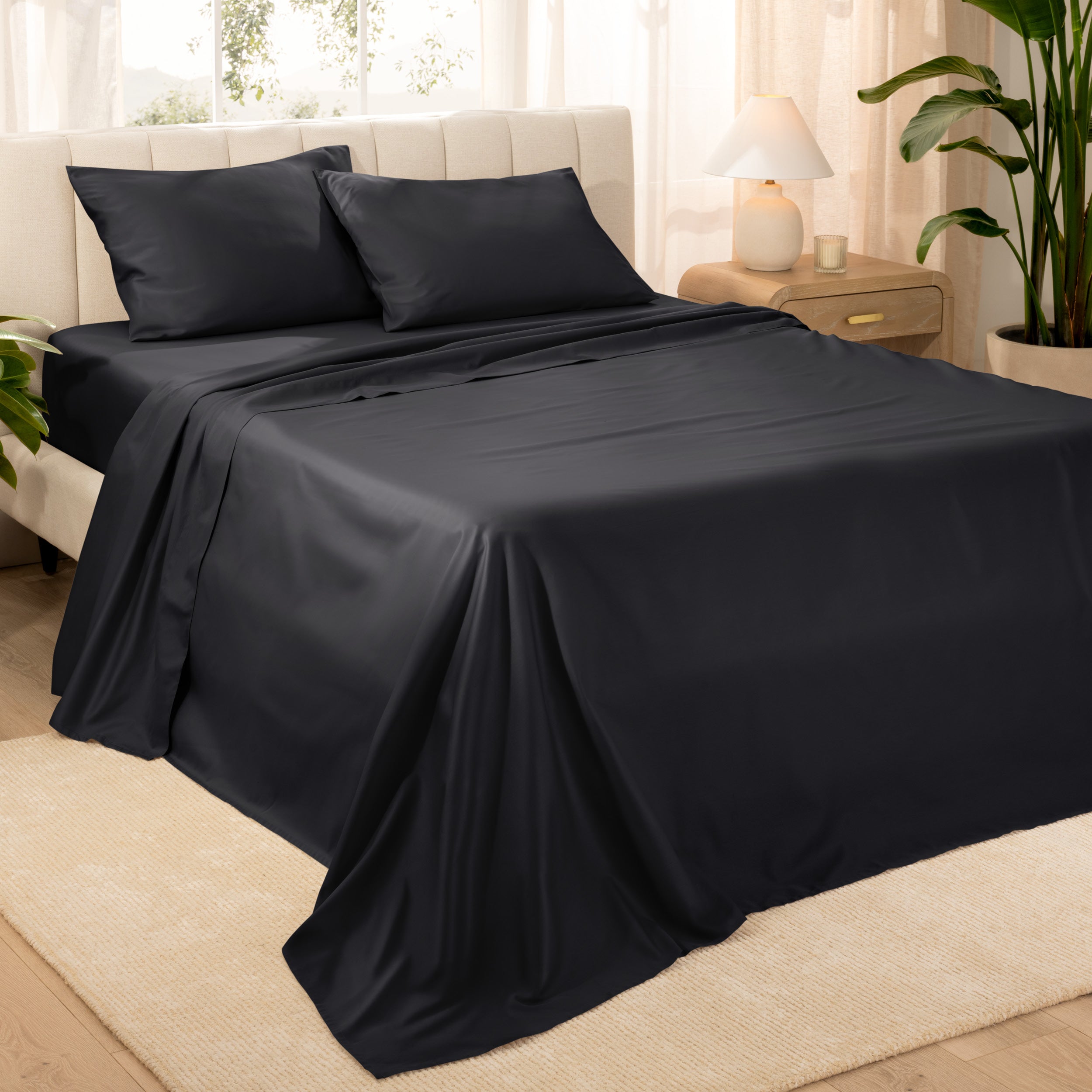 Diagonal view of a decorated room scene with sateen sheets