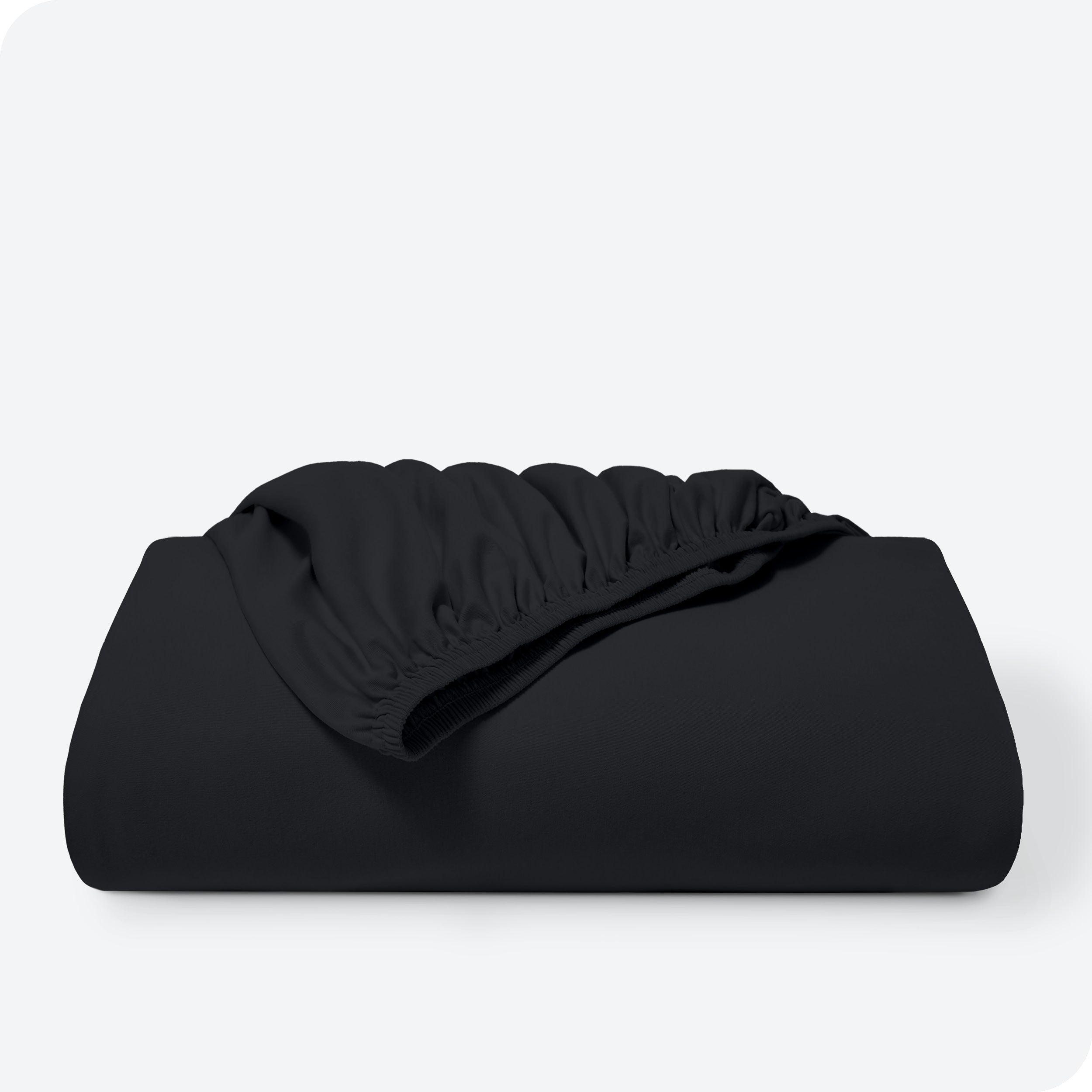 A single organic cotton fitted sheet folded
