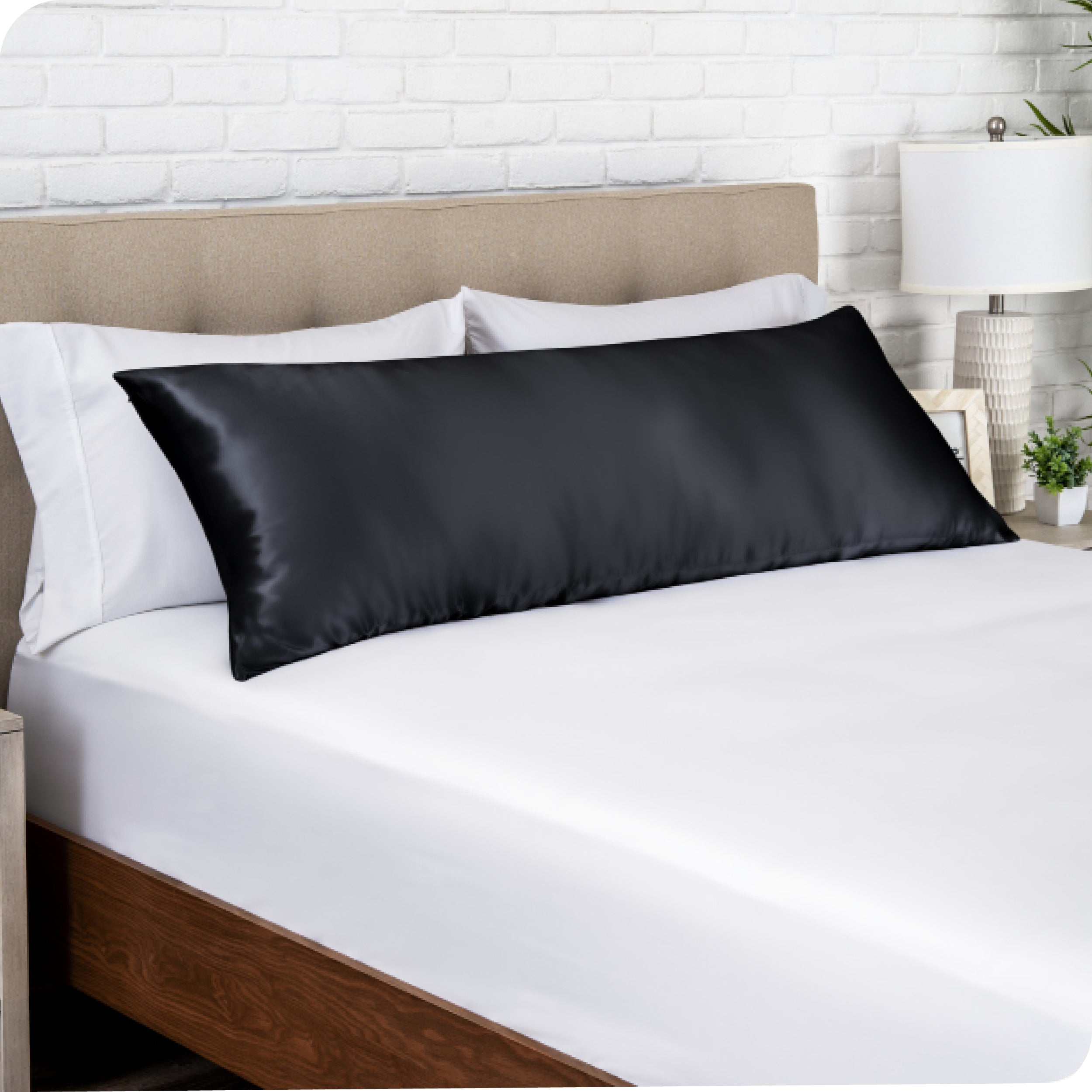 A satin body pillowcase on a pillow