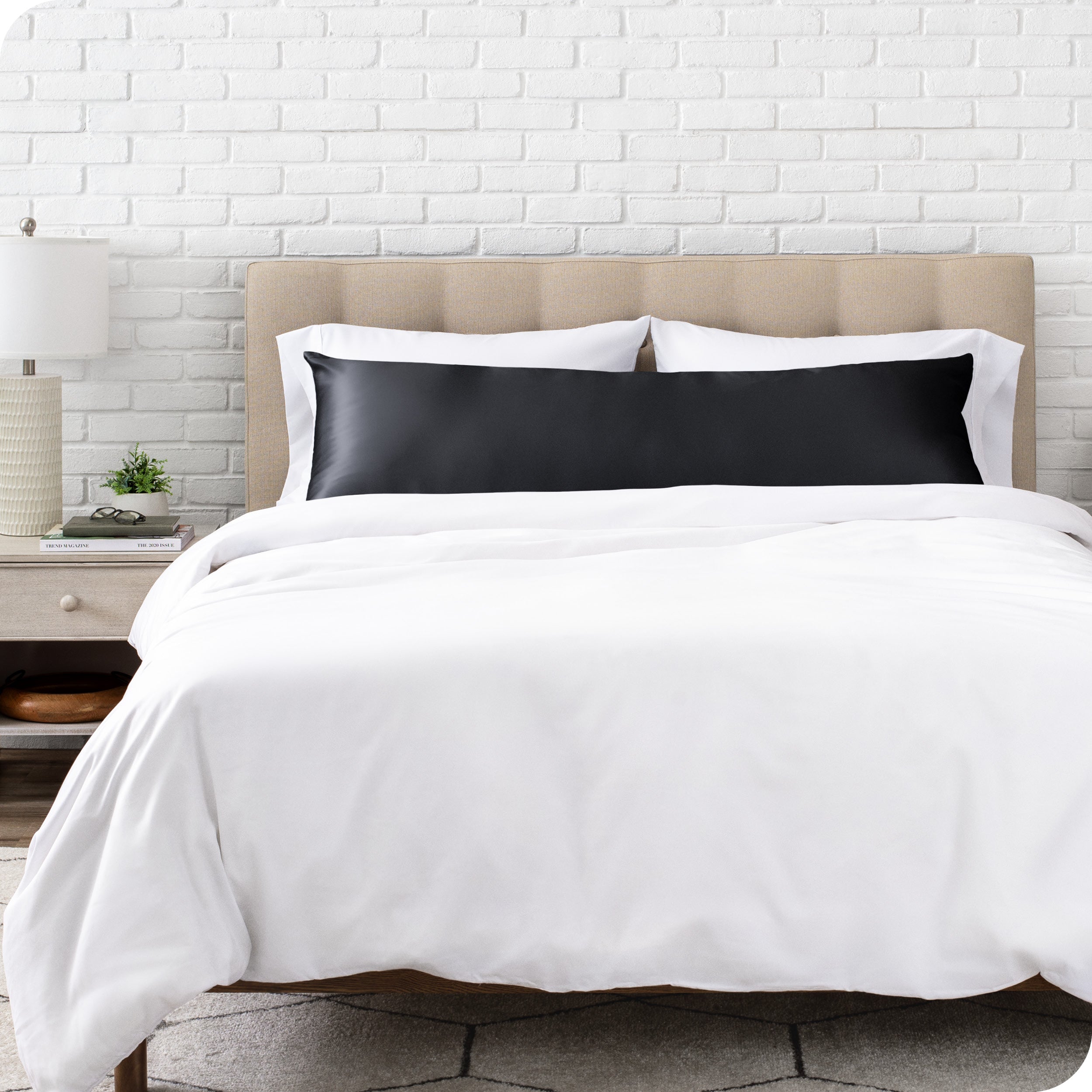 A satin body pillowcase on a pillow