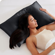 A woman sleeping on a silk pillowcase