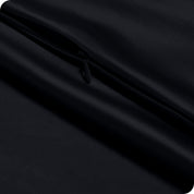 Zipper on a satin pillowcase