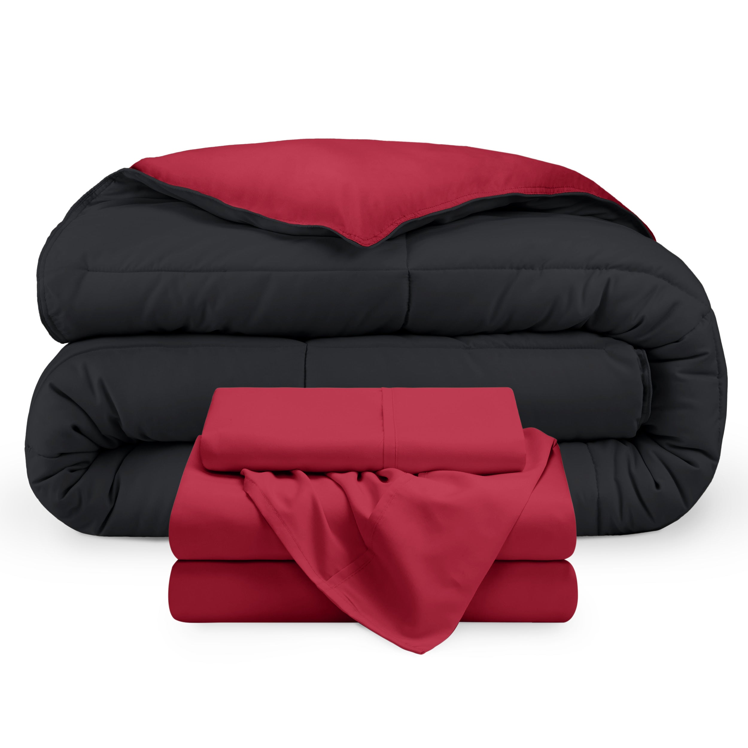 A reversible microfiber comforter and a coordinating sheet set folded and stacked 