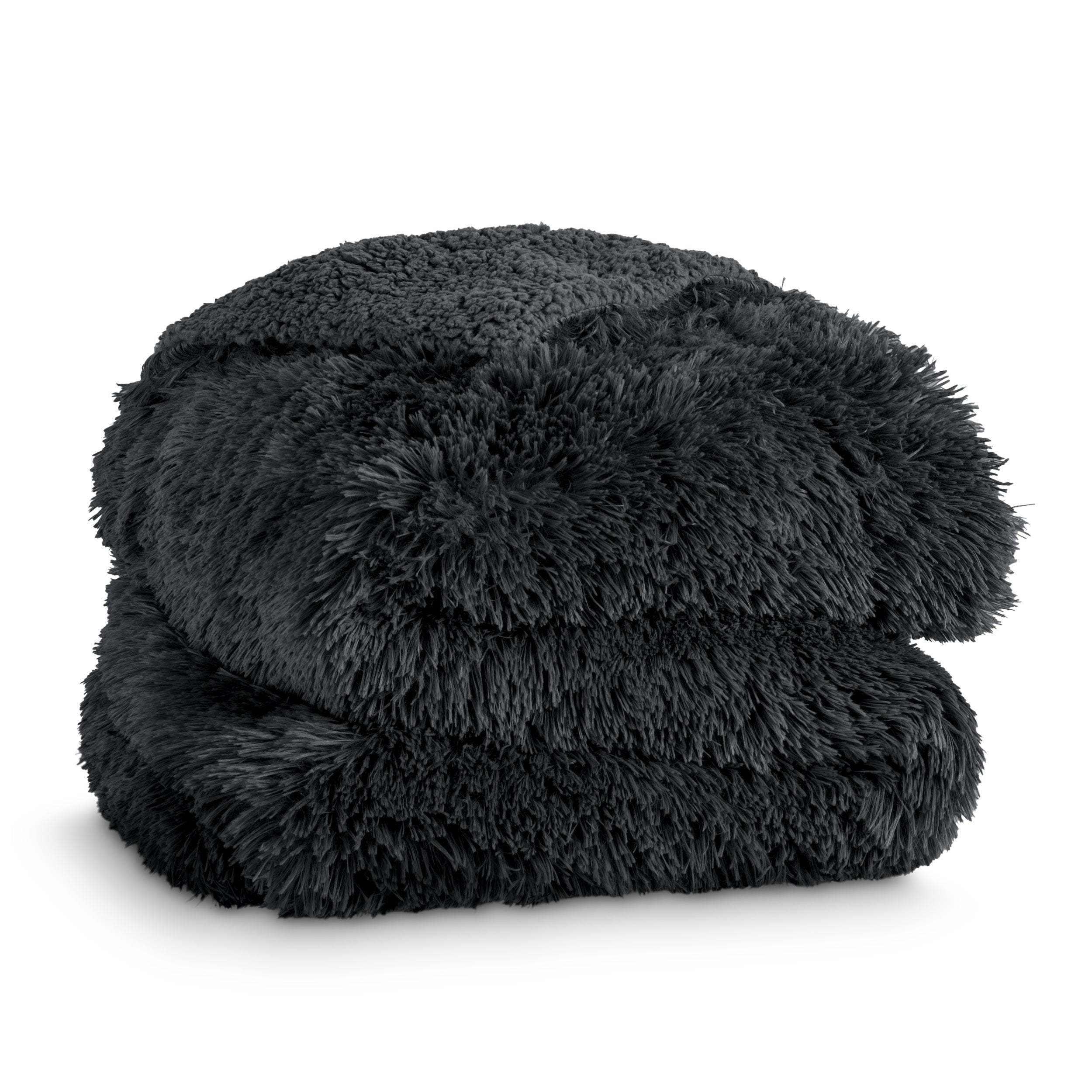 A shaggy faux fur blanket folded