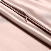 Zipper on a satin pillowcase