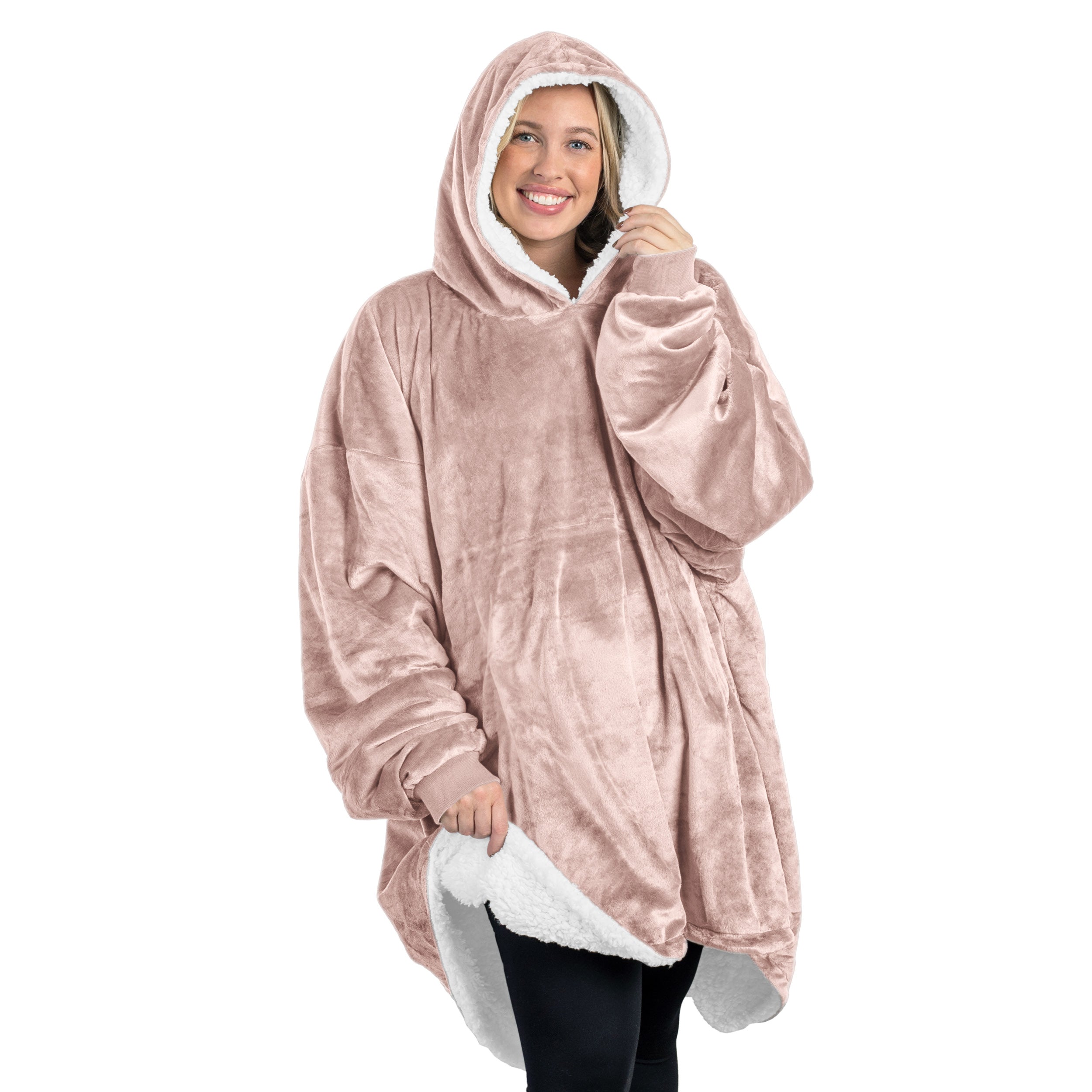 An adult with a sherpa wearable blanket on