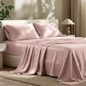 Tencel bed sheets and pillowcases on a bed in a bedroom setting.