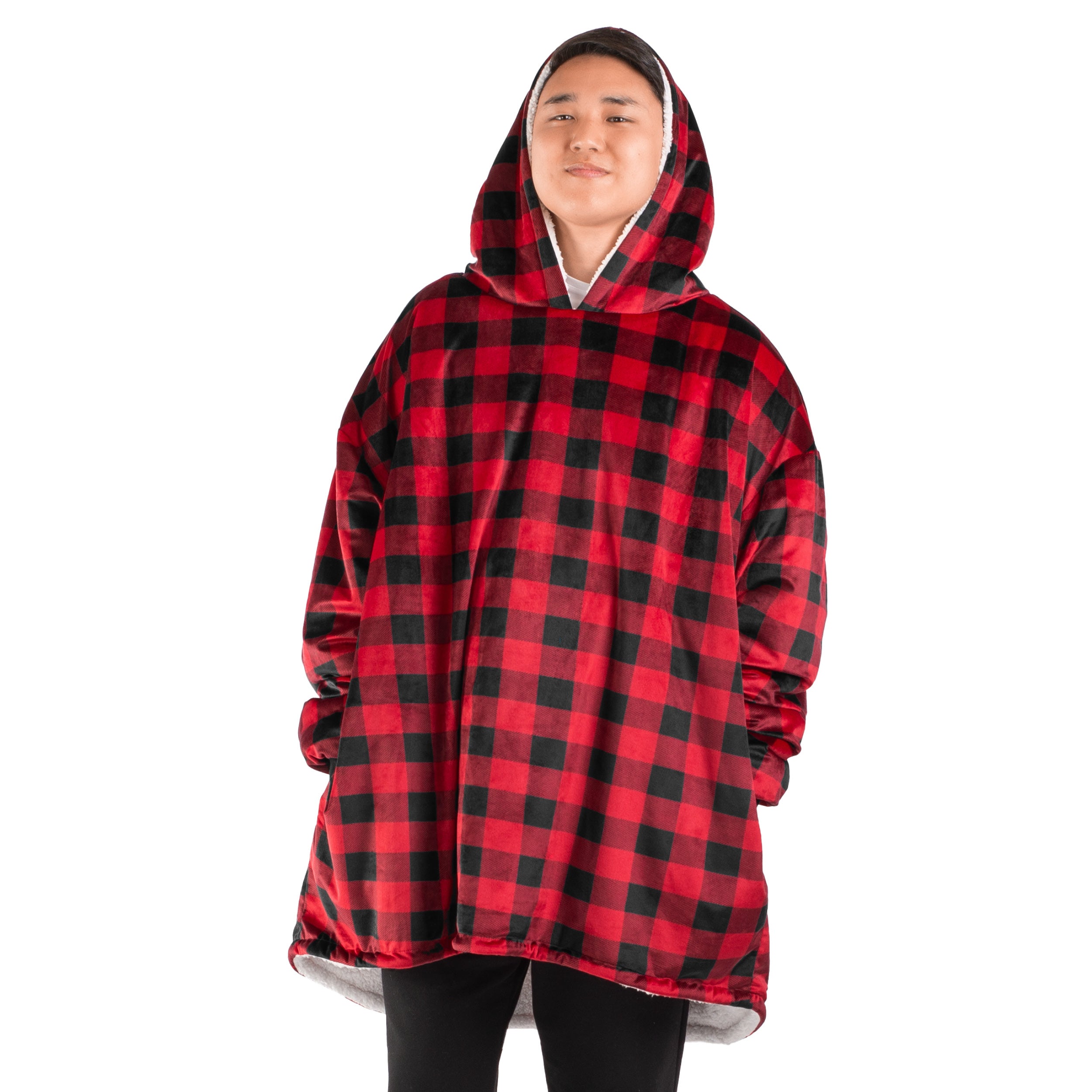 An adult with a sherpa wearable blanket on