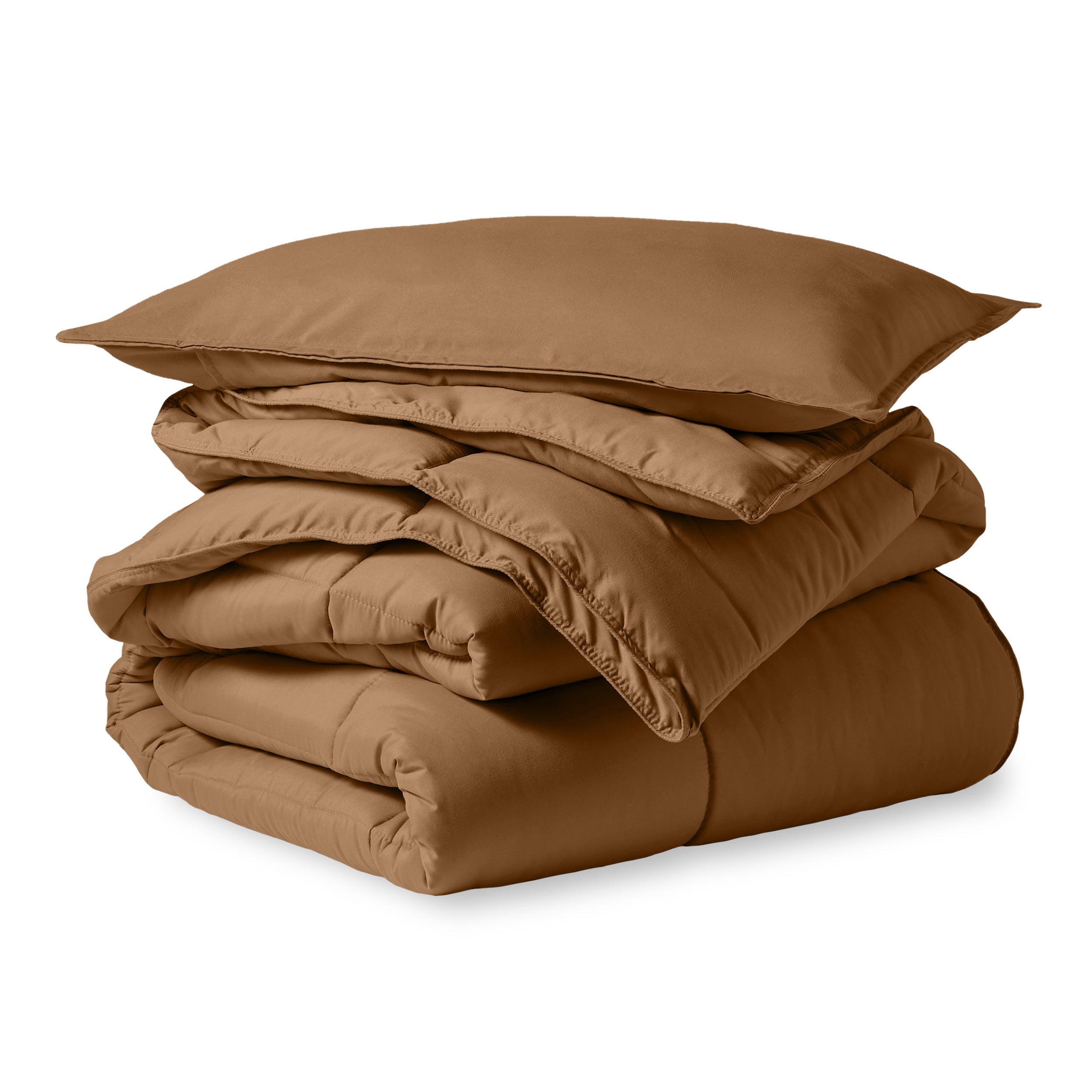 A microfiber comforter folded neatly with a pillow from above