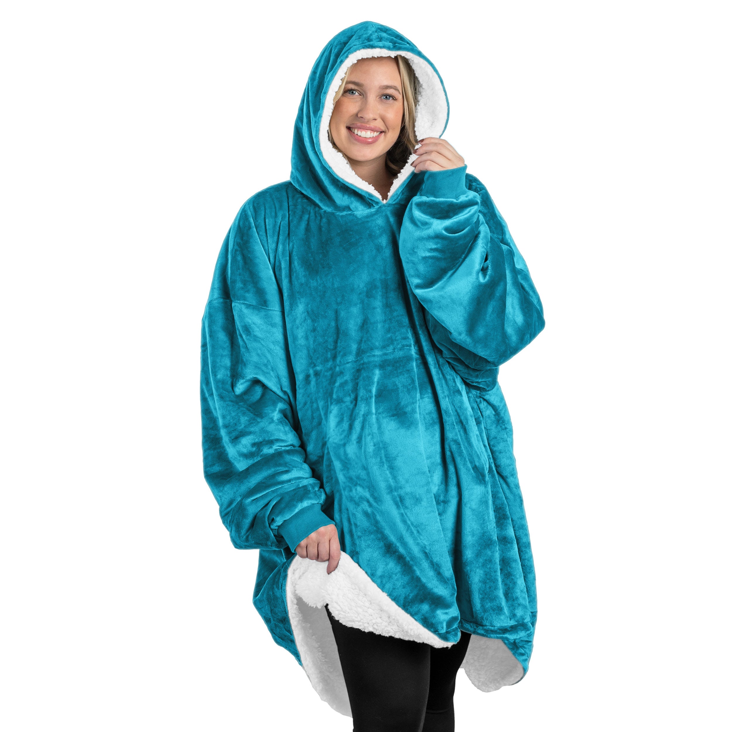 An adult with a sherpa wearable blanket on