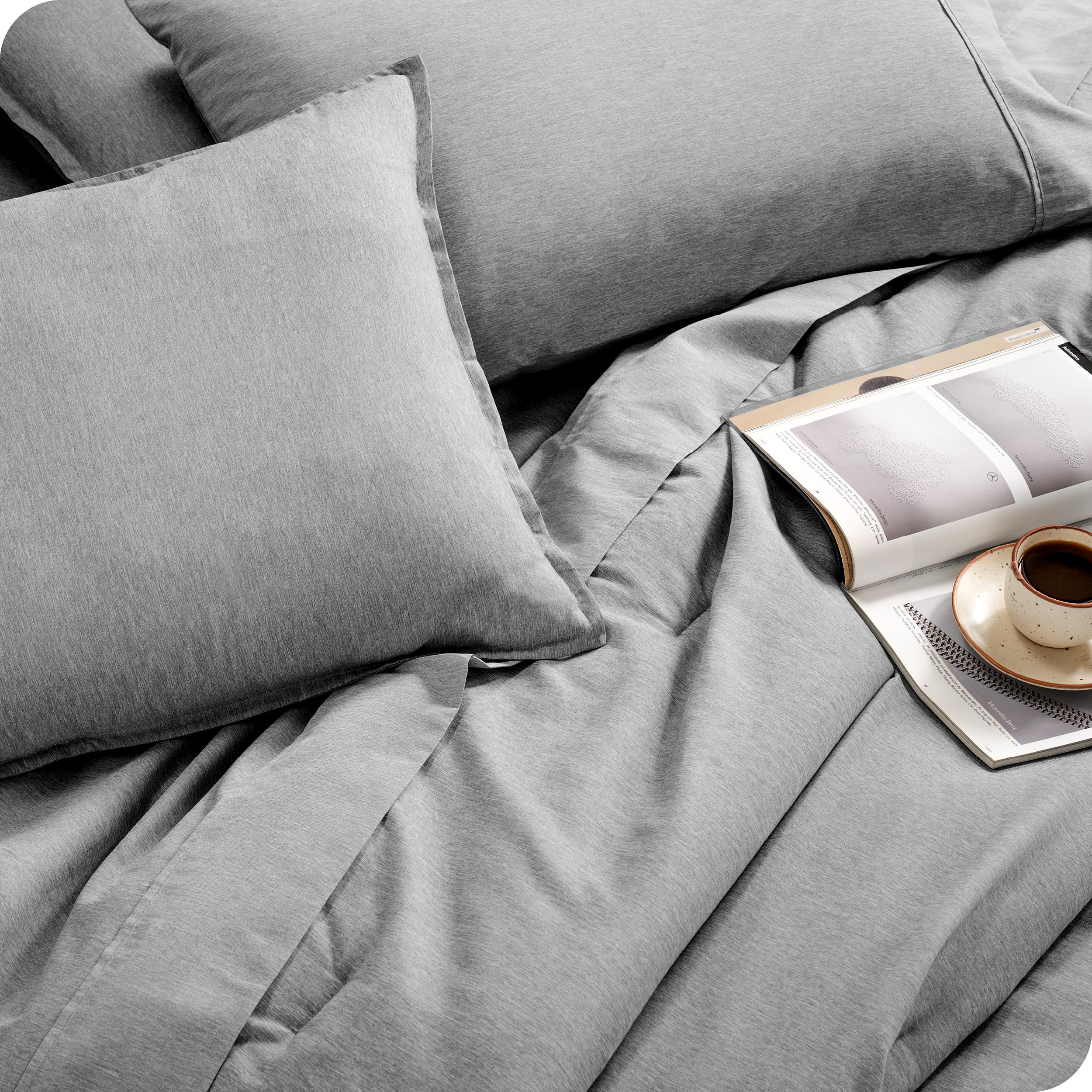Close of matching sheets, comforter, pillowcases and pillow shams on a bed