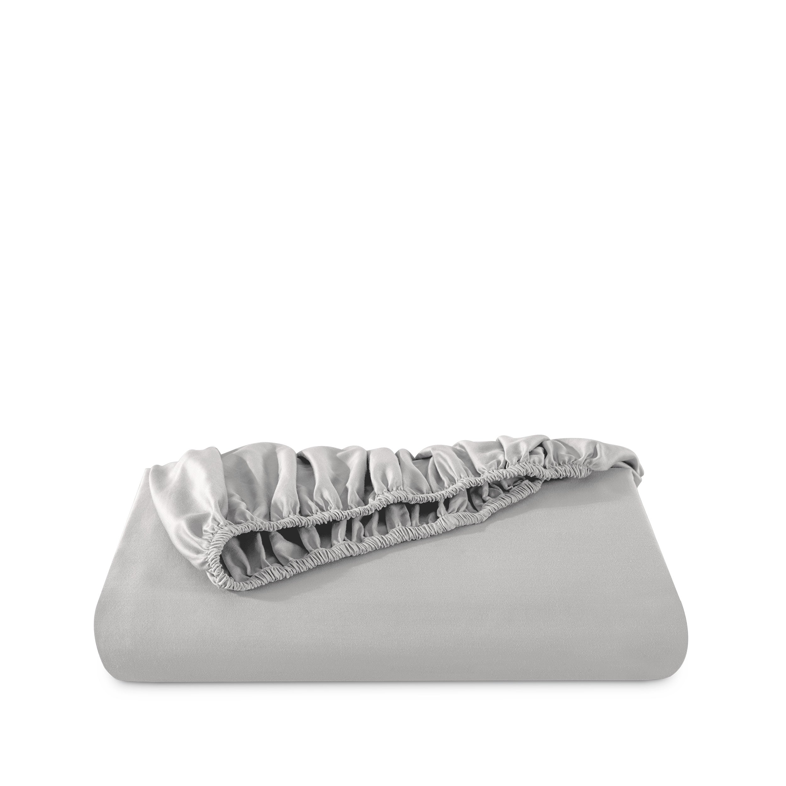 Fitted sheet neatly folded on a white background