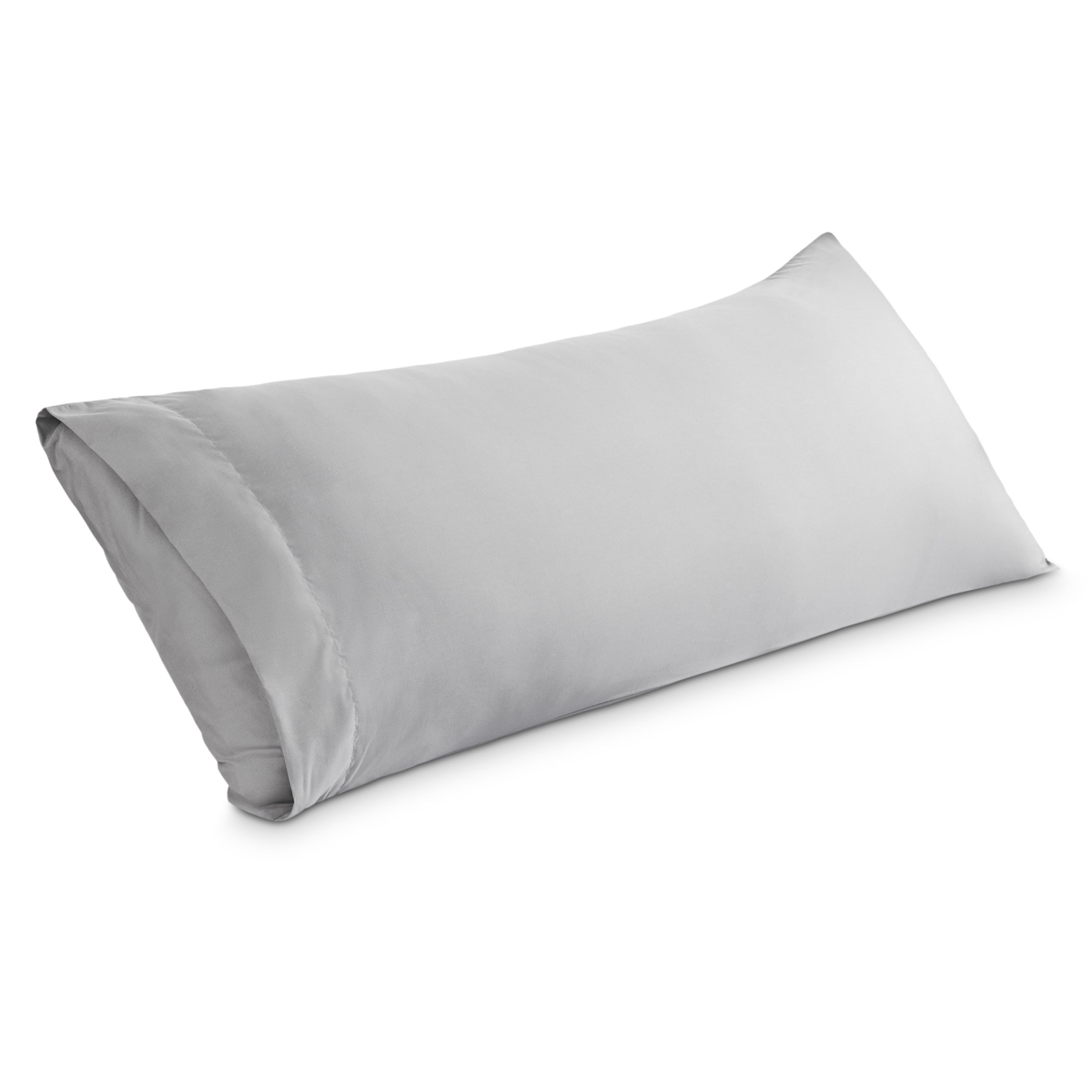 A body pillowcase on a pillow set against a headboard
