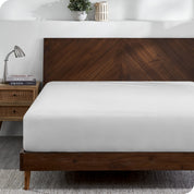 A jersey fitted sheet on a mattress