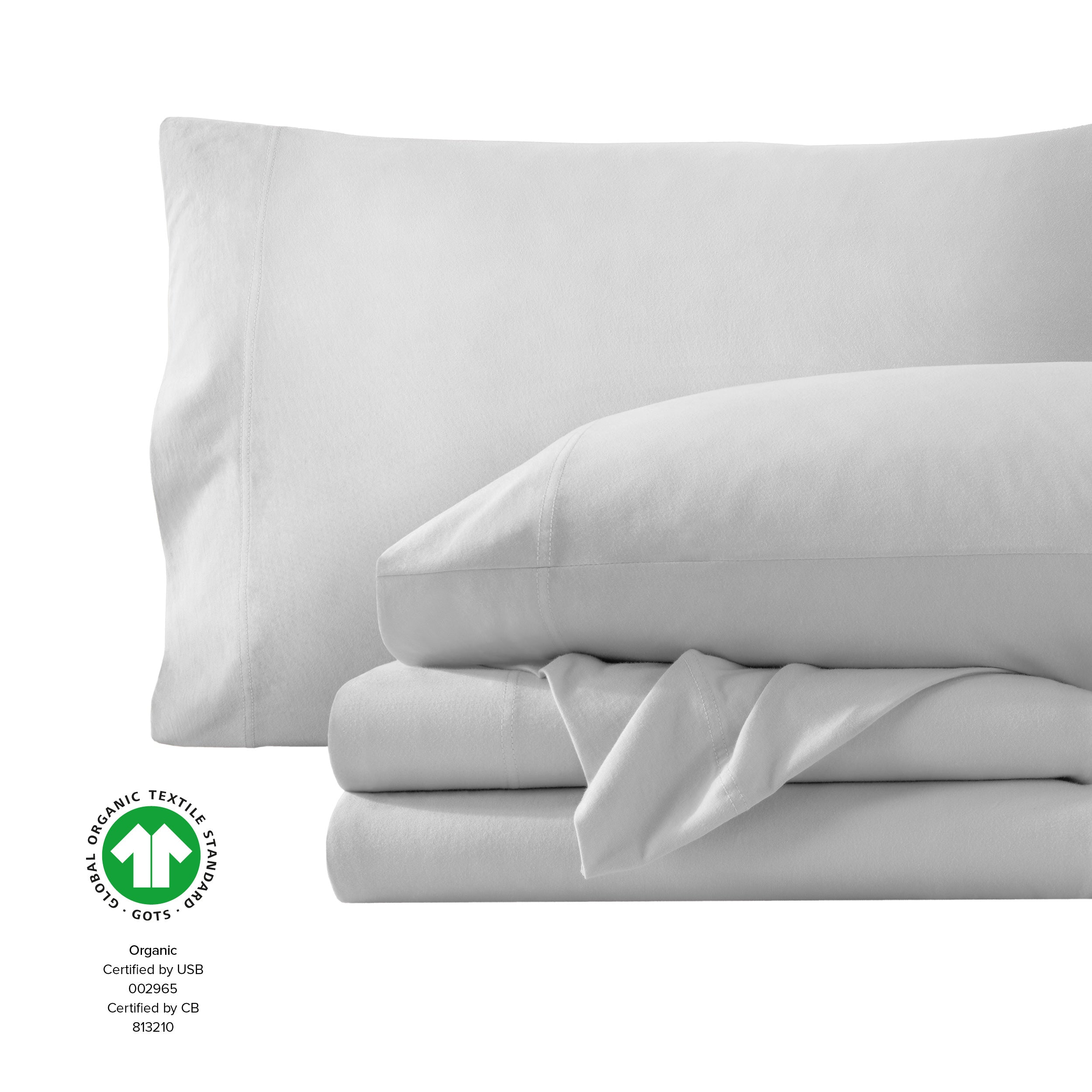 Organic jersey sheets folded and stacked