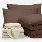 A bed in a bag folded and stacked neatly