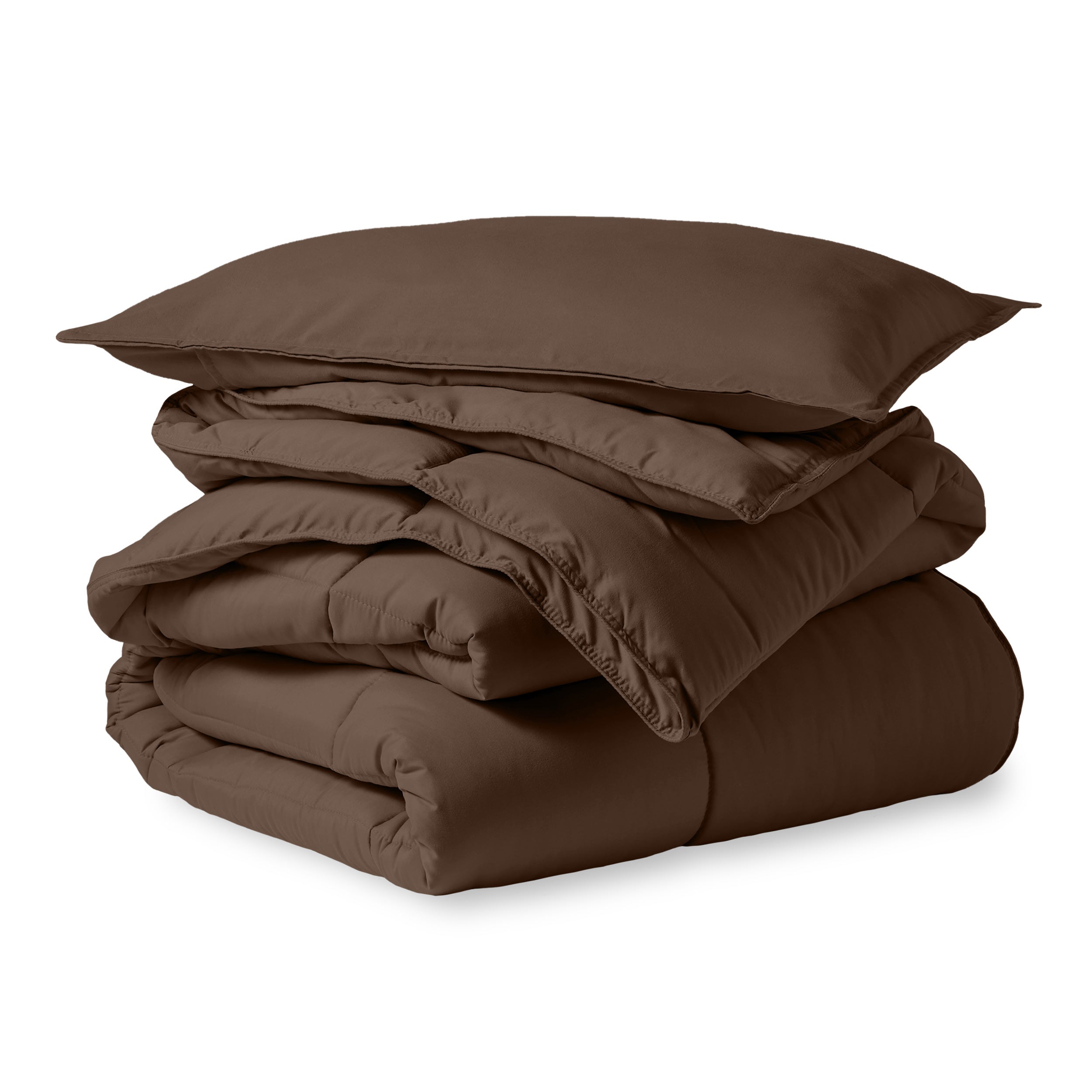 A microfiber comforter folded neatly with a pillow from above