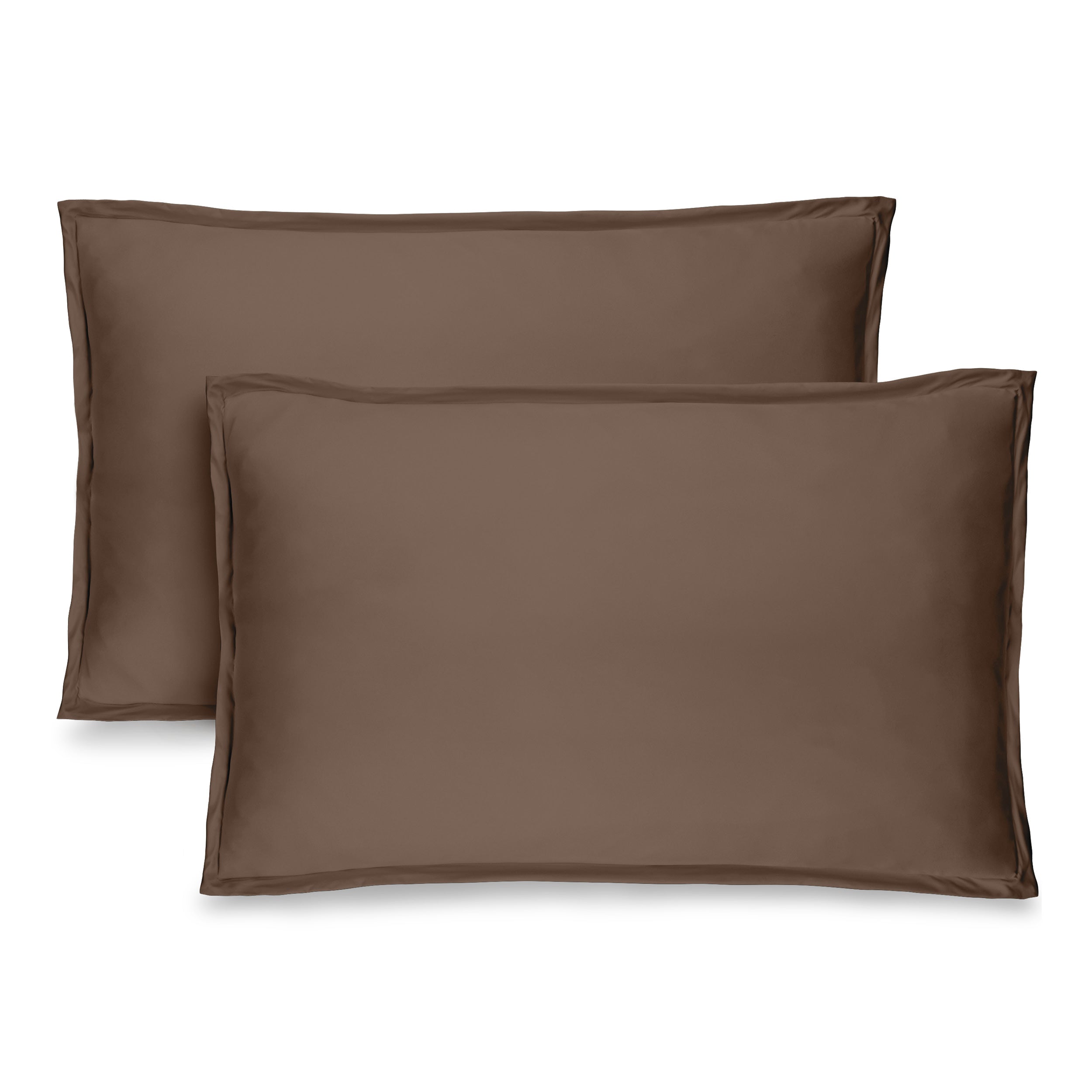 Two pillow shams on pillows standing up with one behind the other