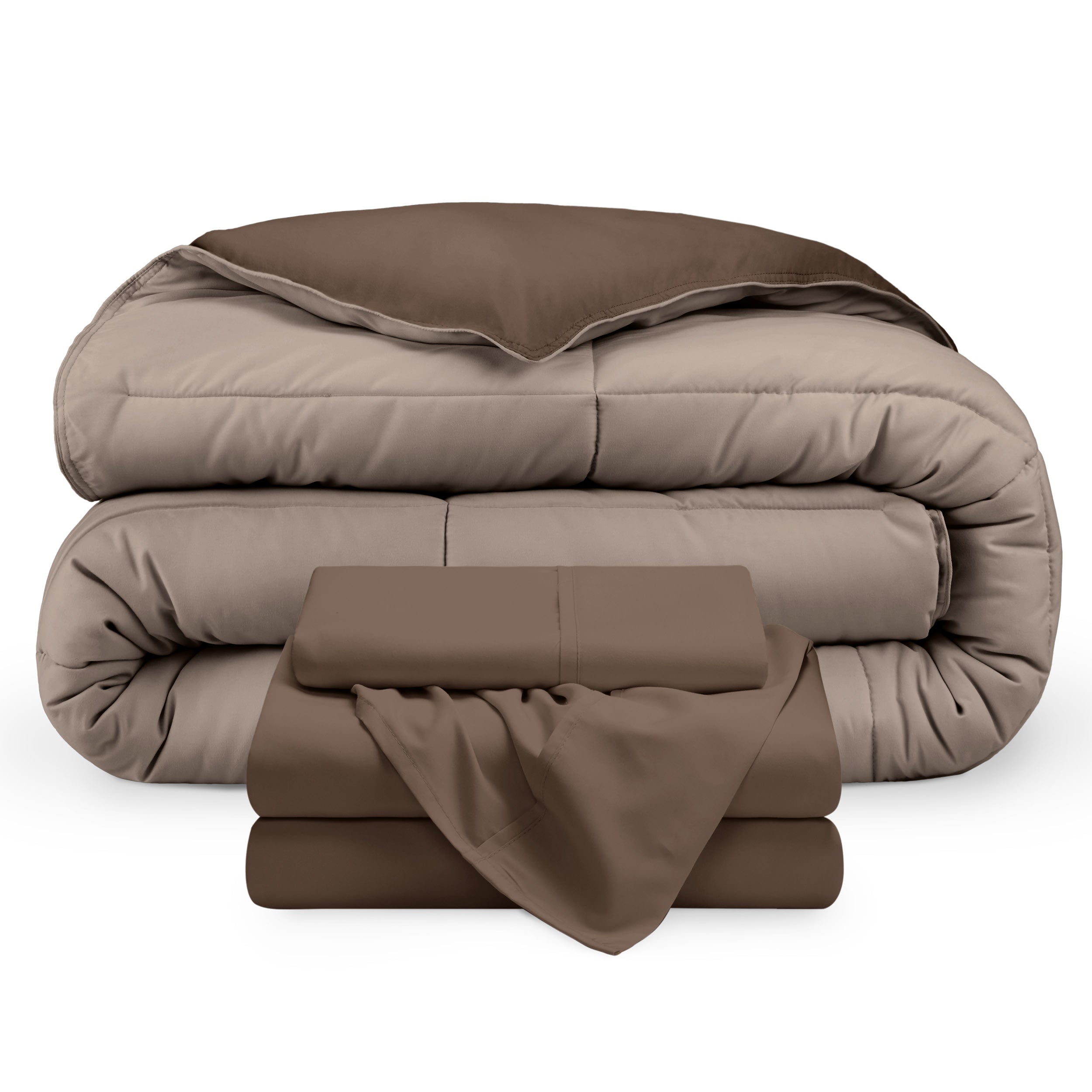 A reversible microfiber comforter and a coordinating sheet set folded and stacked 