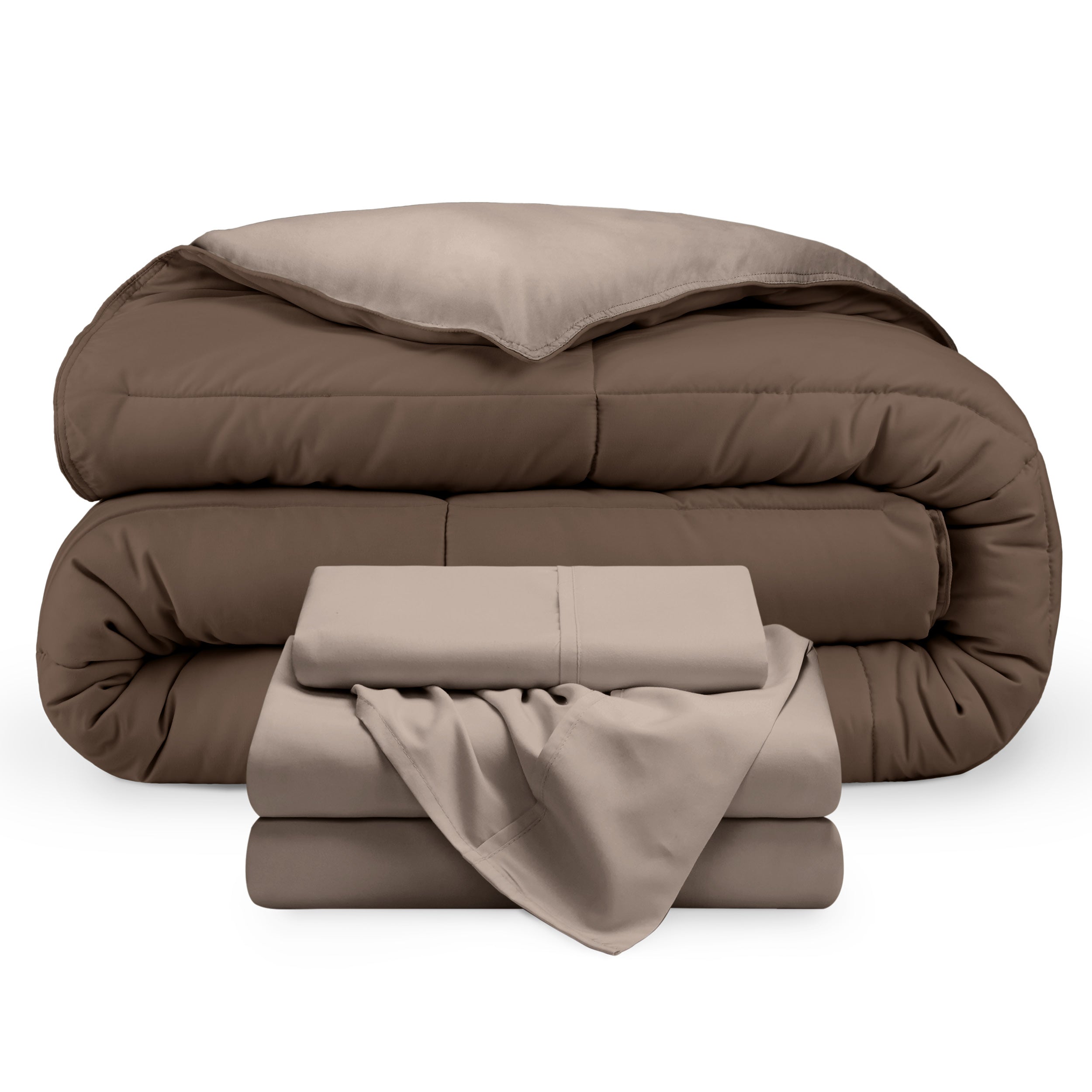 A reversible microfiber comforter and a coordinating sheet set folded and stacked 
