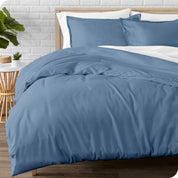 A modern bed with a flannel duvet cover set consisting of the duvet cover and two pillows.