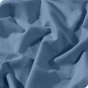 A close view of a button and lining on the flannel duvet cover.