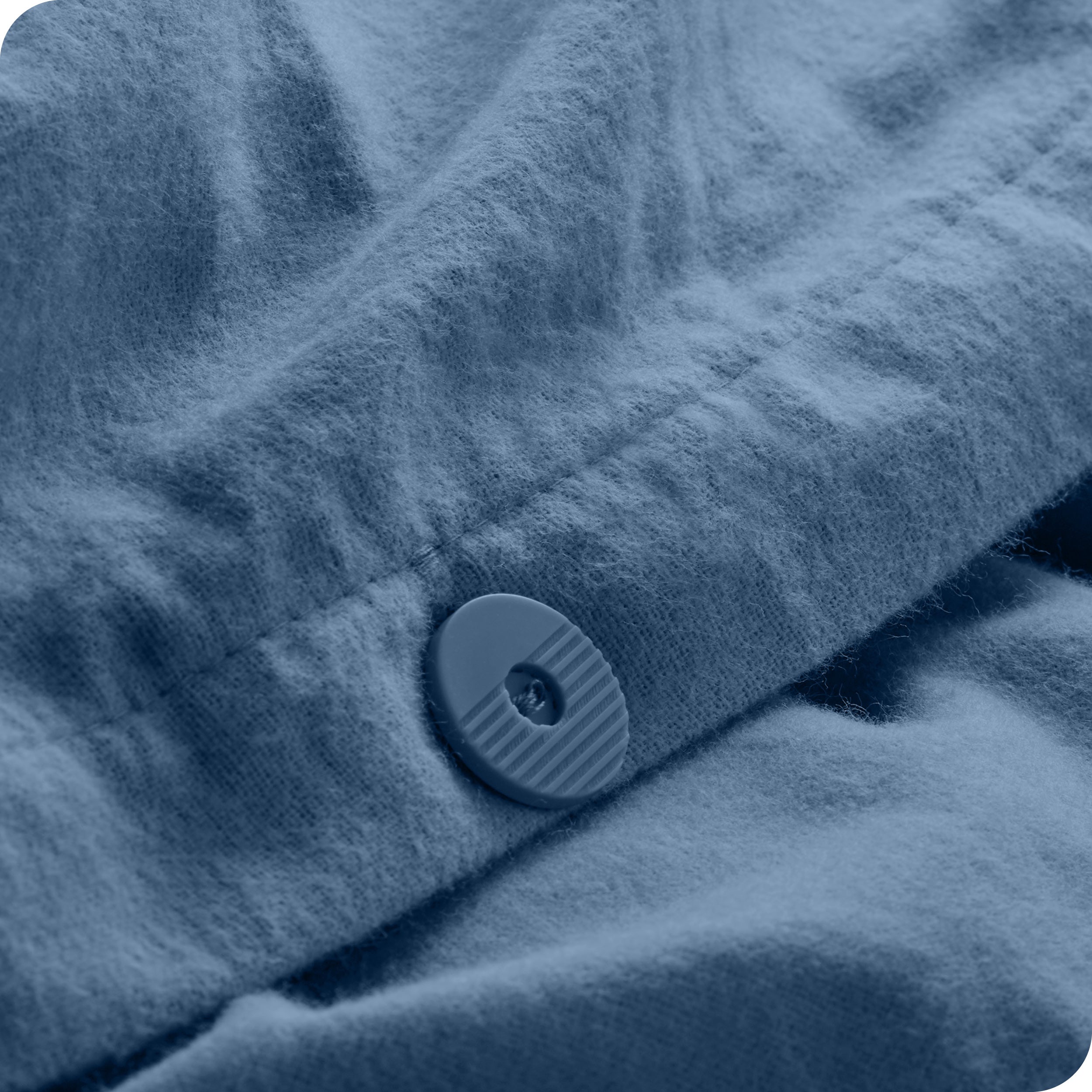 A close up of the tie corner of the duvet cover.