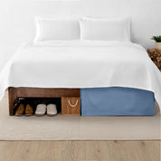A split image showing a bed without a bed skirt on the left and with a bed skirt on the right.