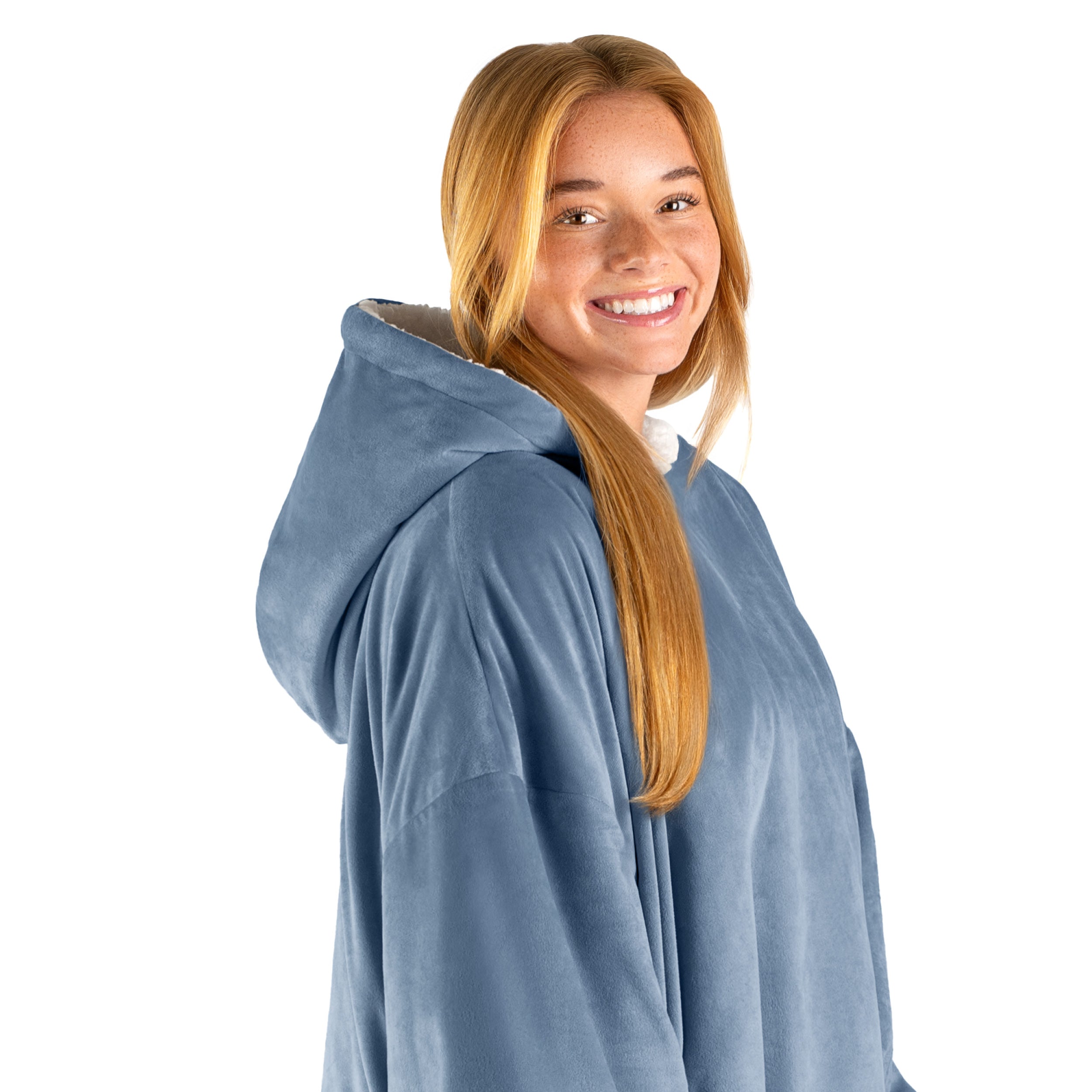 An adult with a hooded wearable blanket on