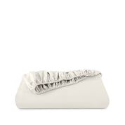 Fitted sheet neatly folded on a white background