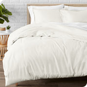 A modern bed with a flannel duvet cover set consisting of the duvet cover and two pillows.