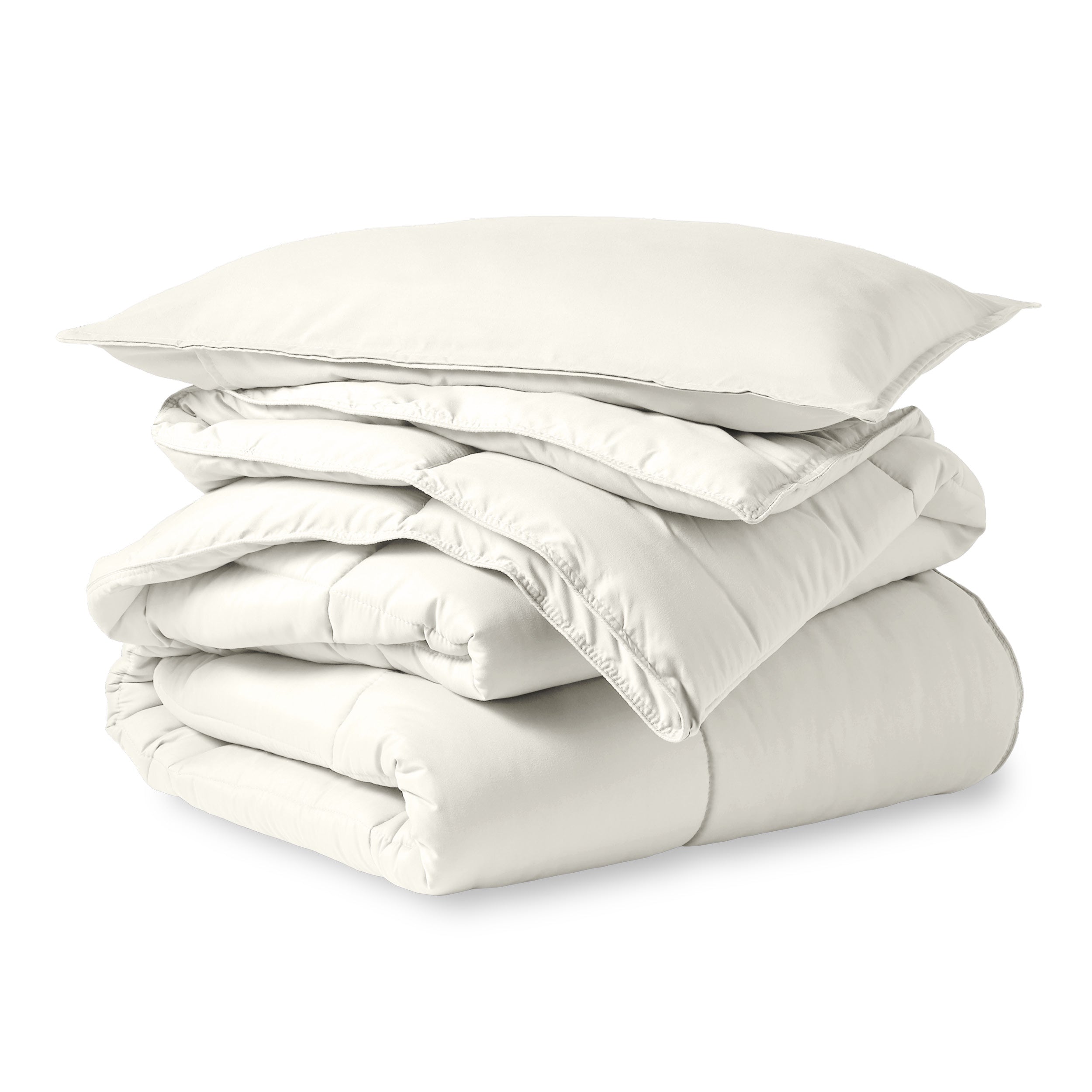 A microfiber comforter folded neatly with a pillow from above
