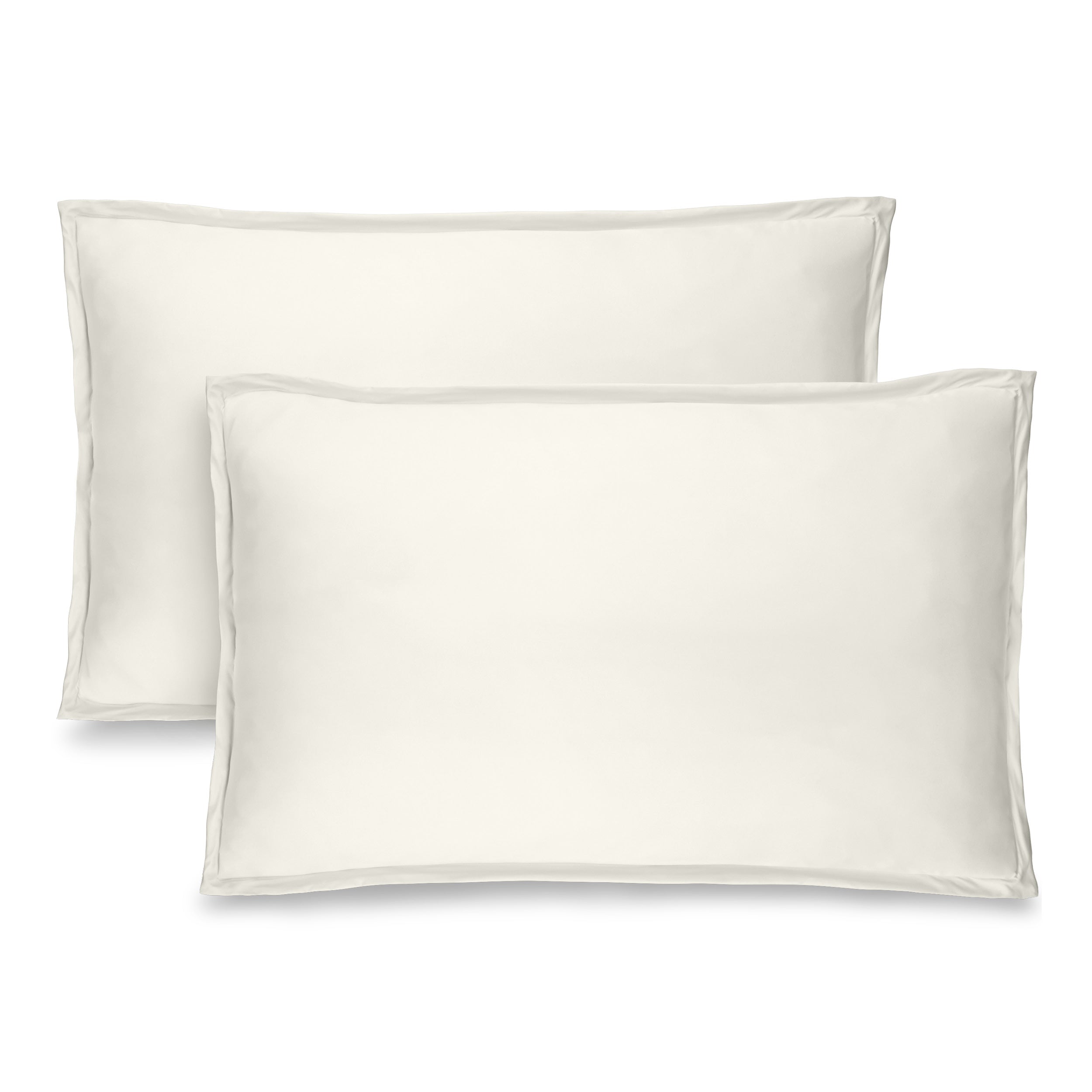 Two pillow shams on pillows standing up with one behind the other