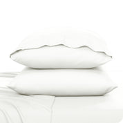2 pillowcases on pillows