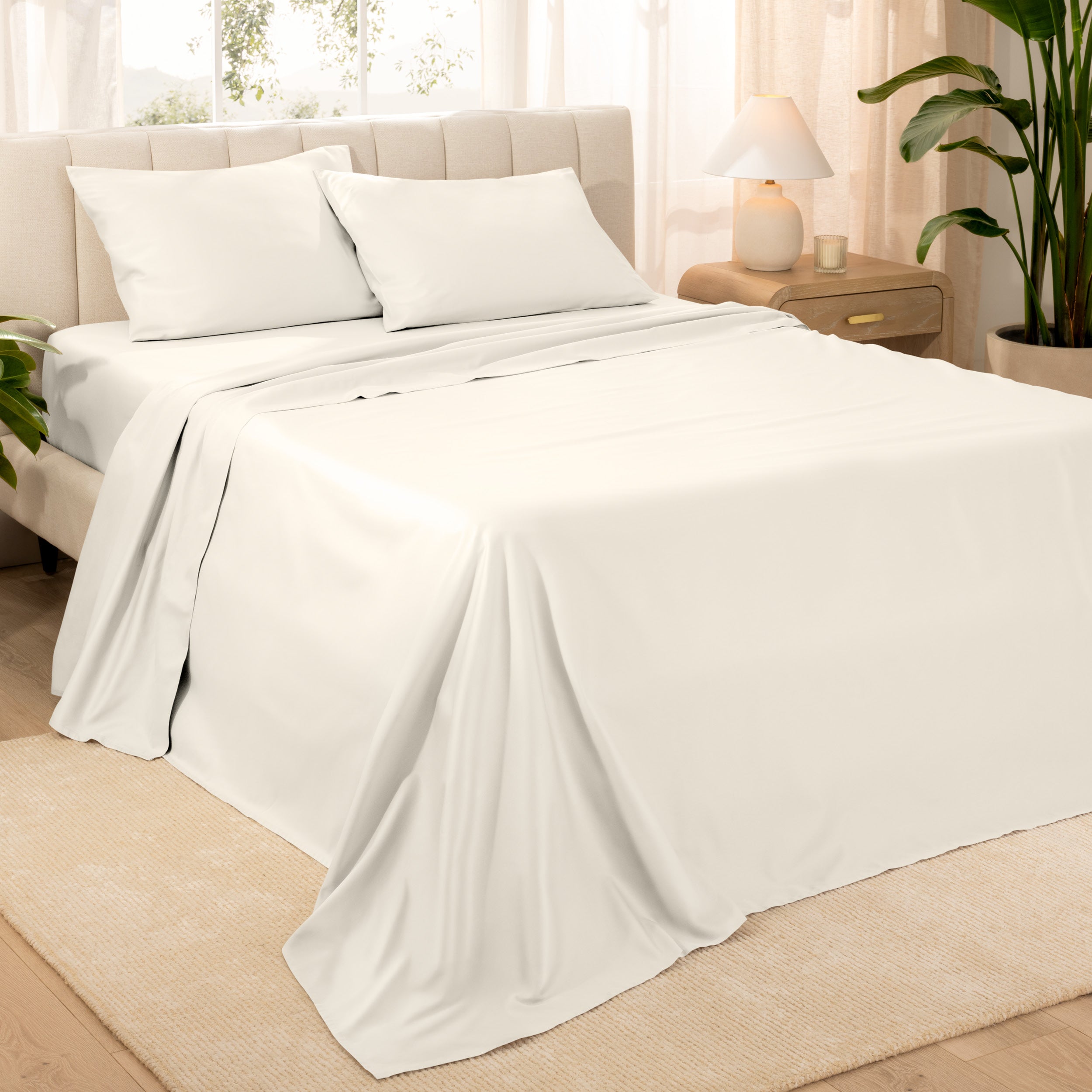 Diagonal view of a decorated room scene with sateen sheets