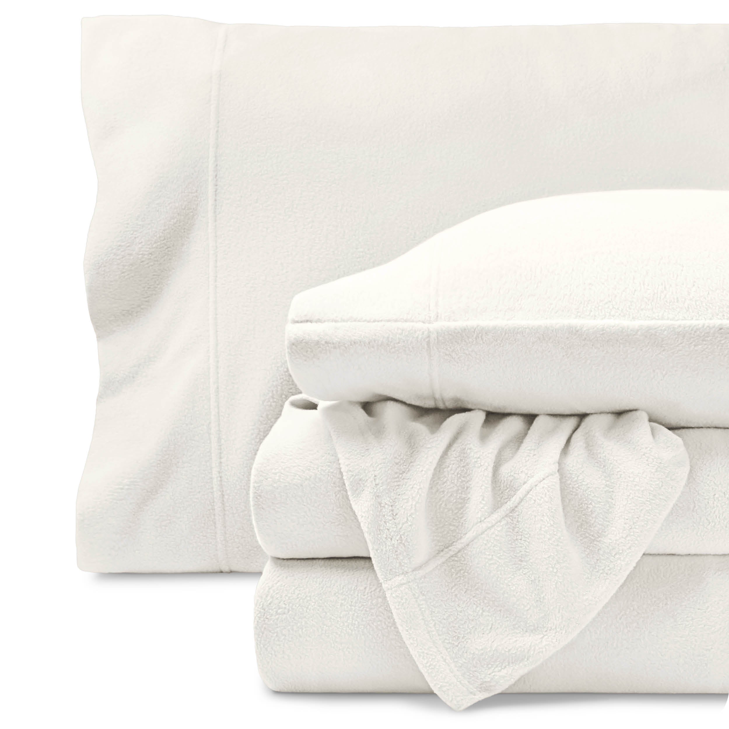Fleece sheets folded neatly and stacked with pillows inside the pillowcases