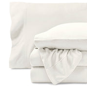 Fleece sheets folded neatly and stacked with pillows inside the pillowcases