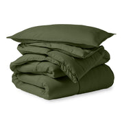 A microfiber comforter folded neatly with a pillow from above