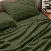 Close up of microfiber extra deep pocket sheets on a mattress

