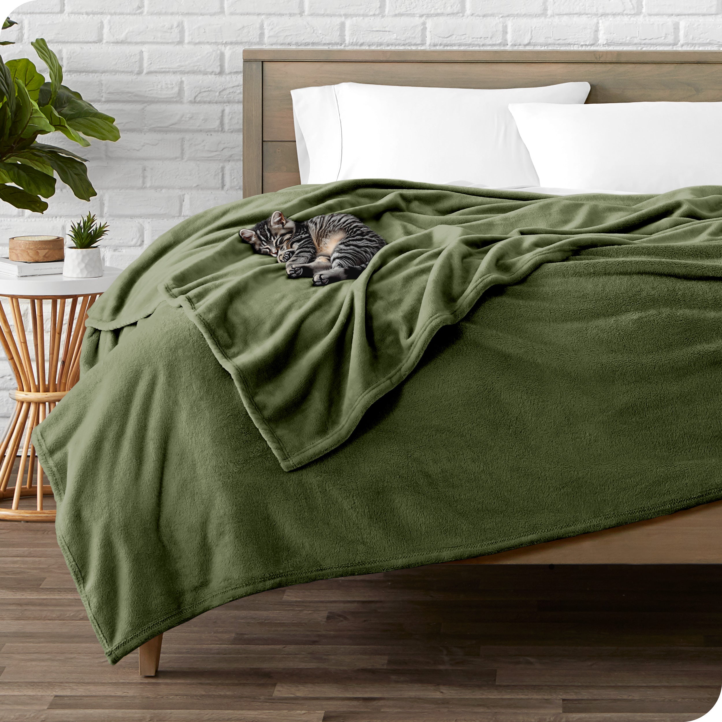 Microplush blanket laid out over a bed and folded back over itself