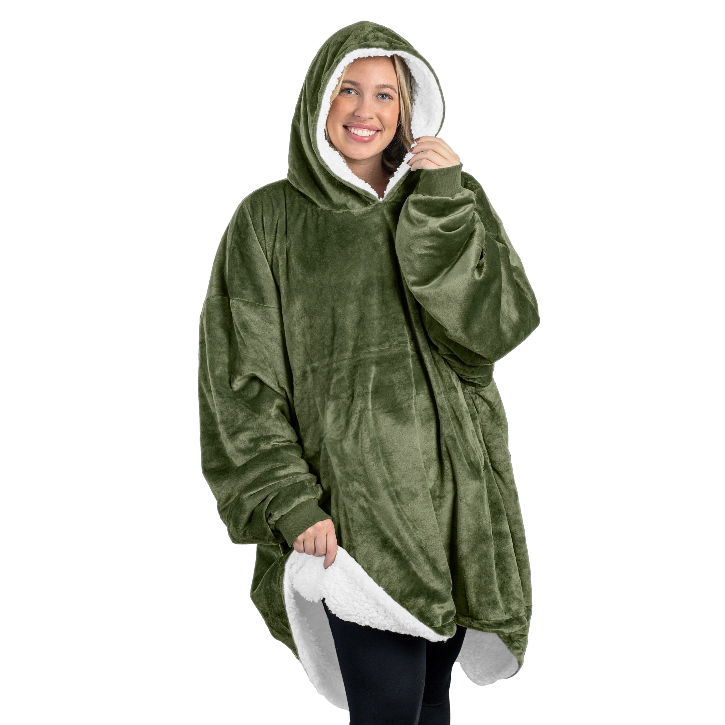 An adult with a sherpa wearable blanket on