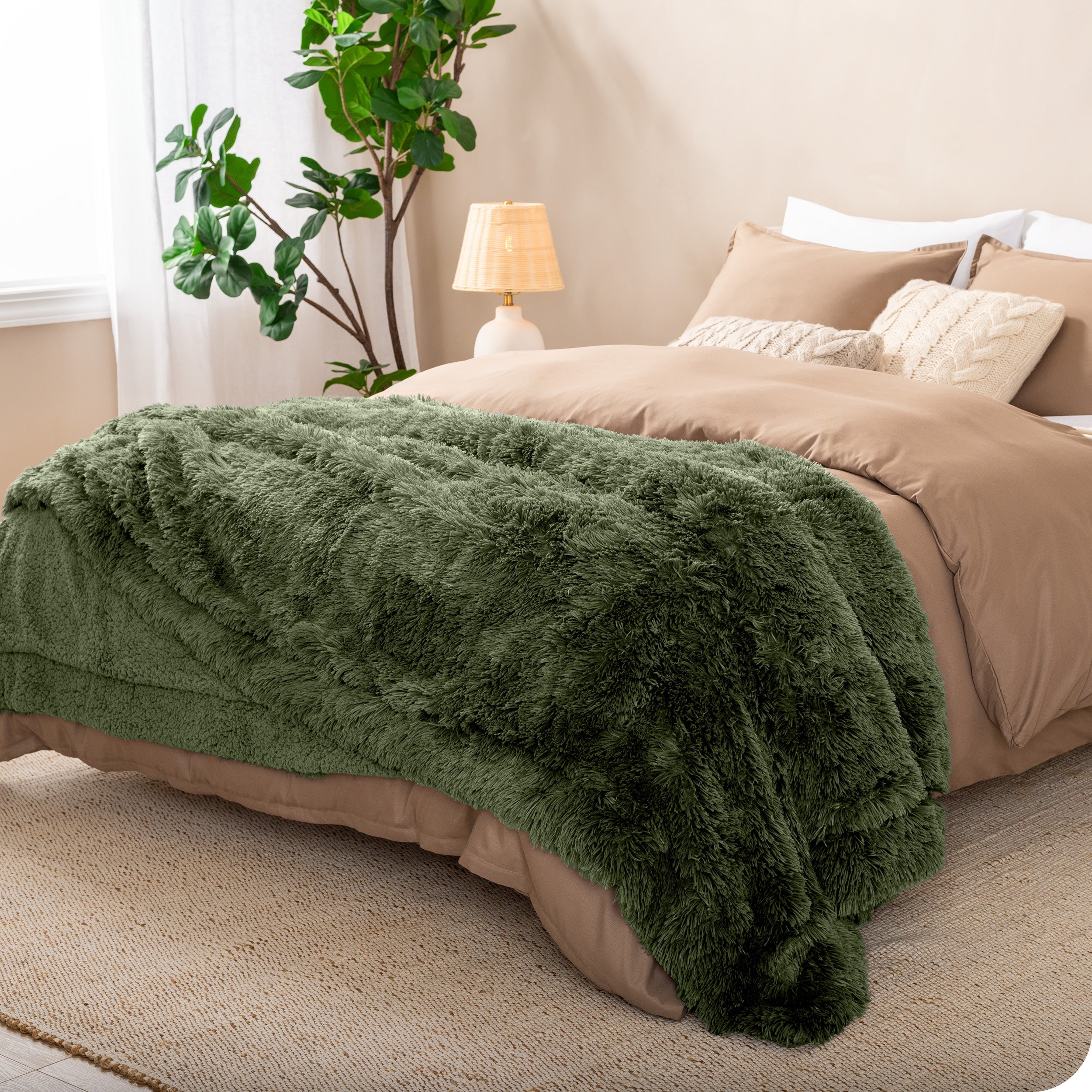 A shaggy faux fur blanket on the end of a bed